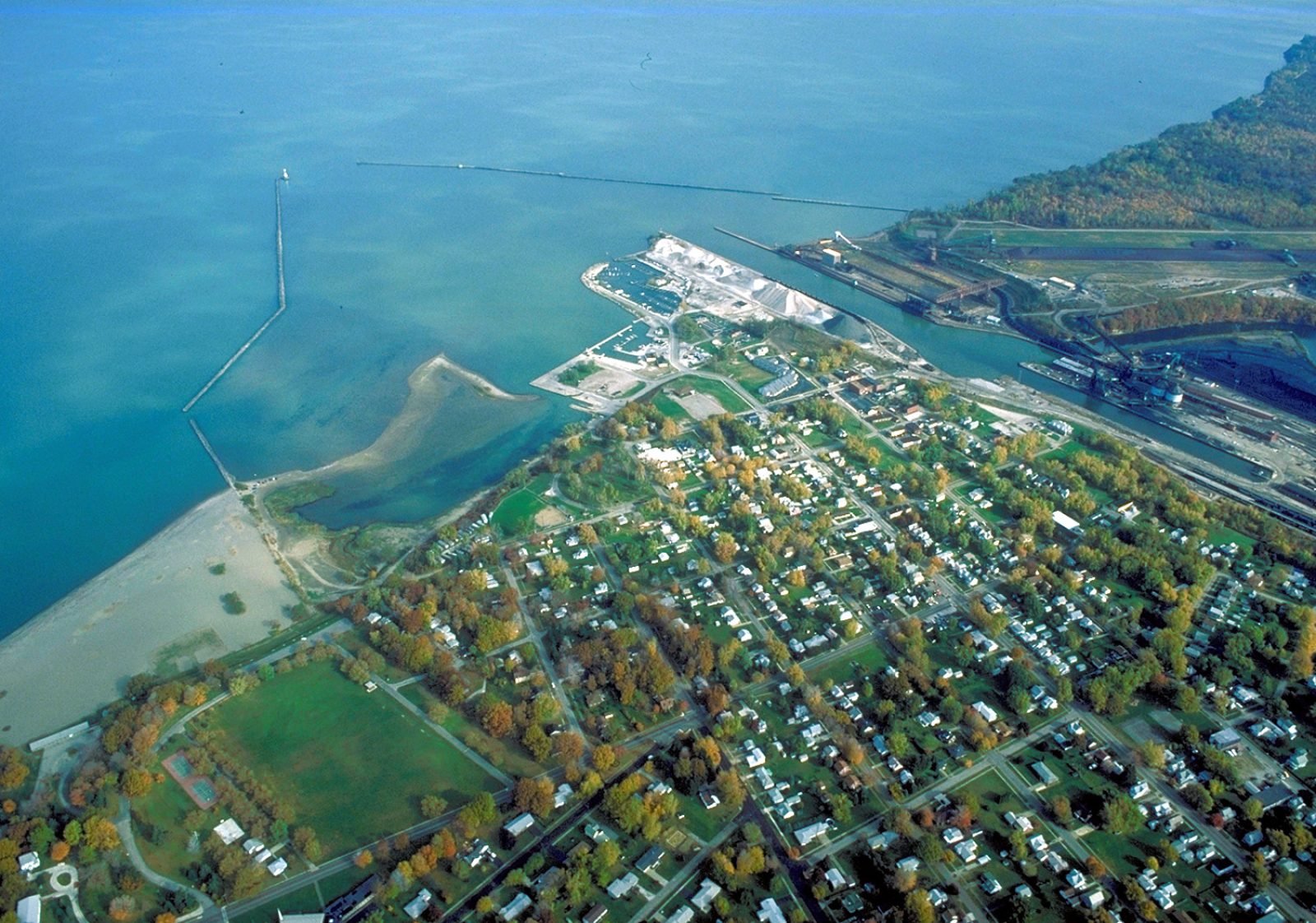 Aerial view of Conneaut, Ohio harbor where Conneaut Creek meets Lake Erie